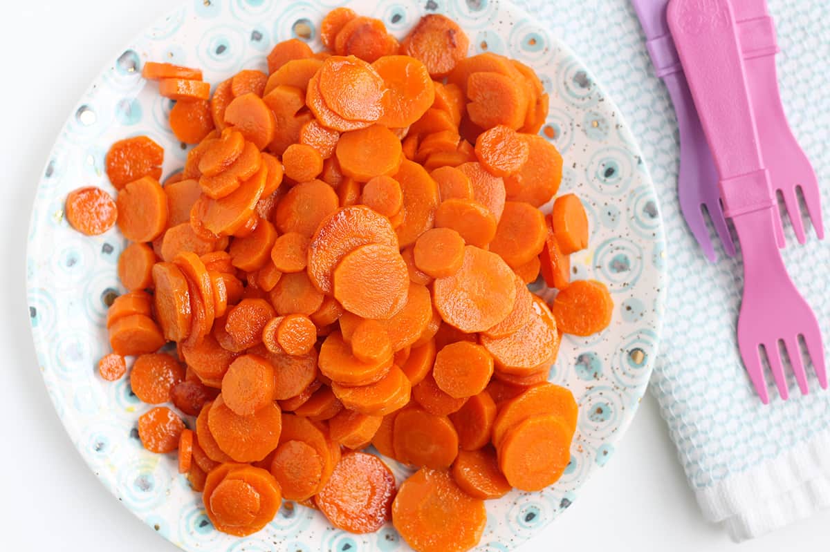 sauteed carrots on polka dot plate.