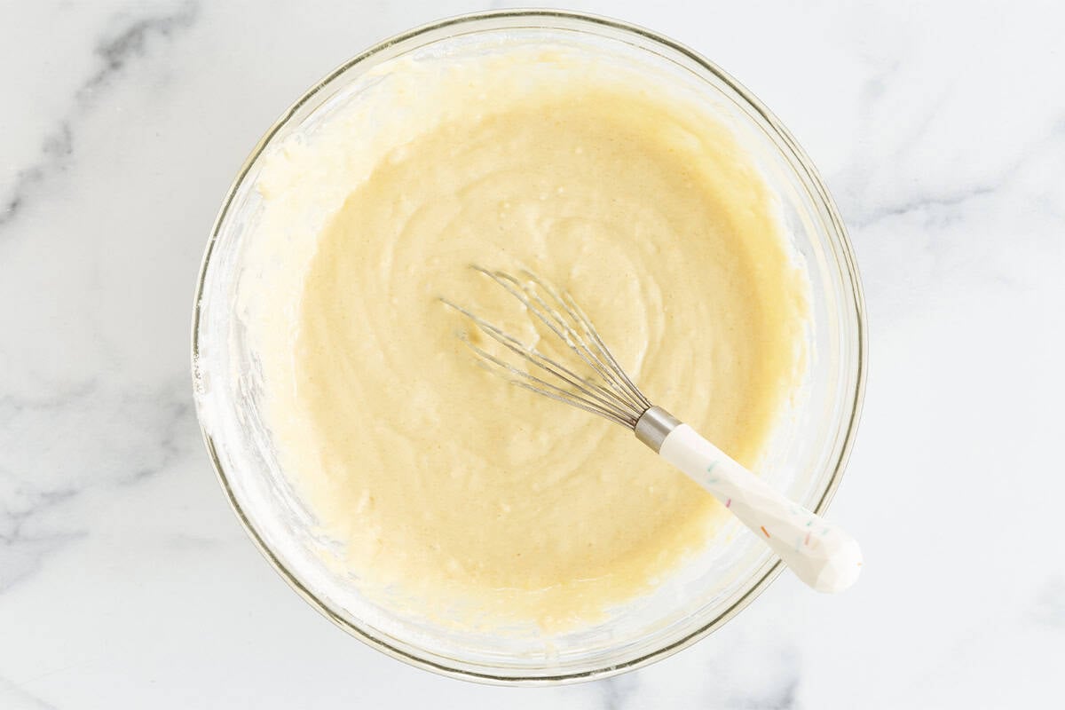 lemon cake batter in glass bowl.