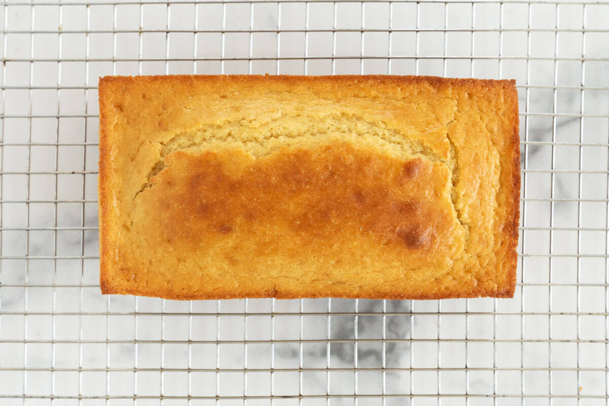 baked lemon cake on wire rack.