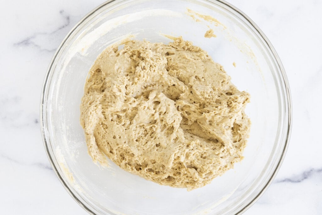 blueberry yogurt muffin batter in glass bowl.
