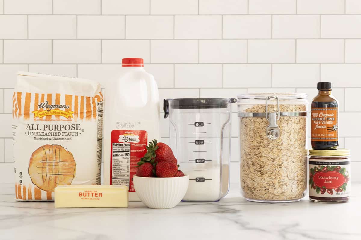Ingredients for strawberry oatmeal bars on countertop.