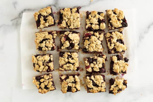 Blueberry oatmeal bars cut into squares.