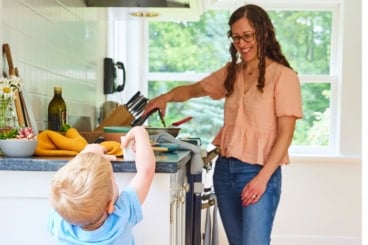 amy cooking in kitchen.