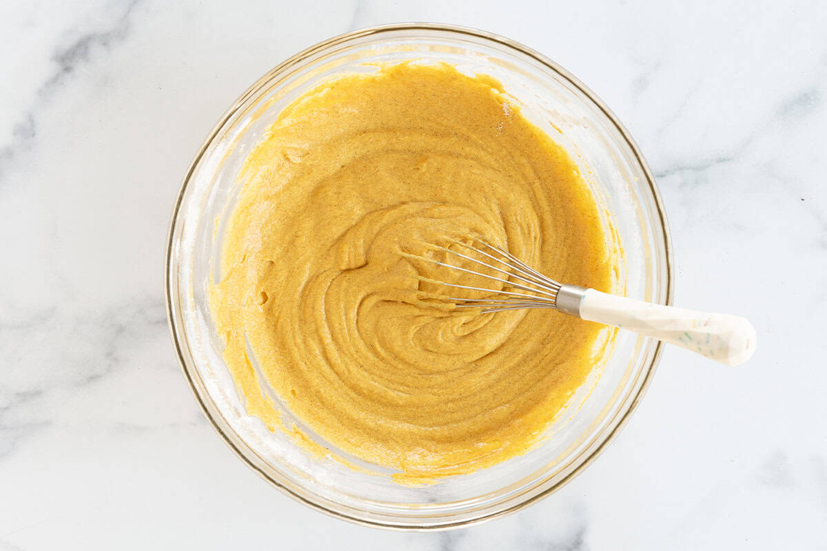 batter for pumpkin cupcakes in glass bowl.