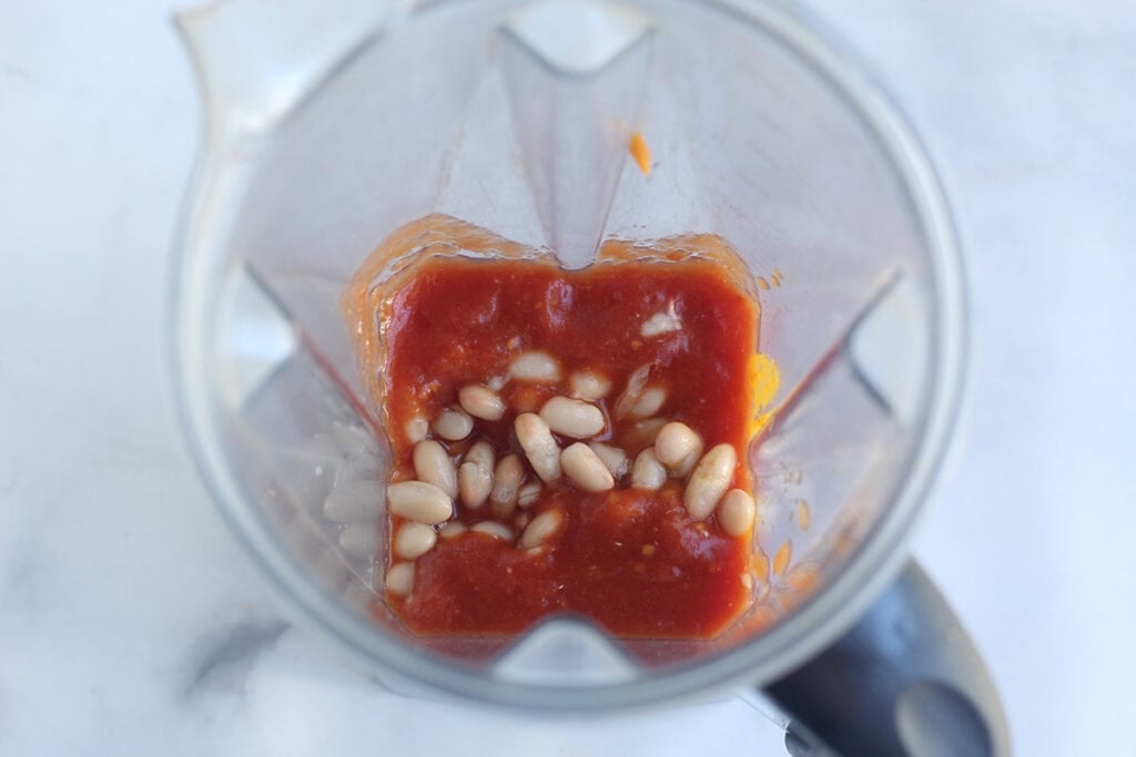 crushed tomatoes and white beans in blender.