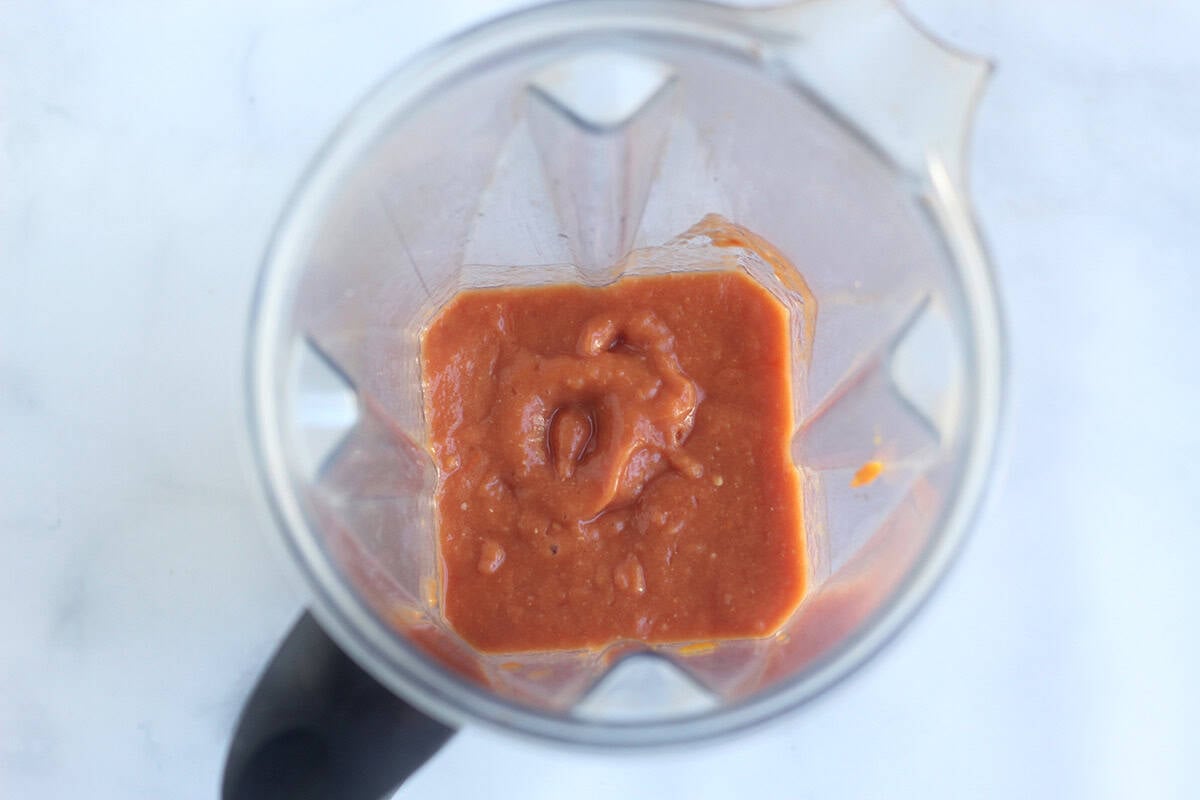 blended tomatoes and white beans in blender.