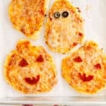 halloween pizza on baking sheet.