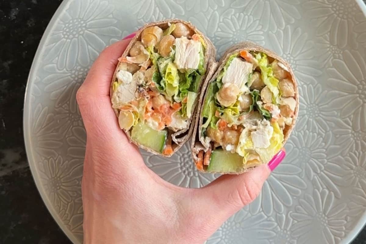 salad wrap in hand.