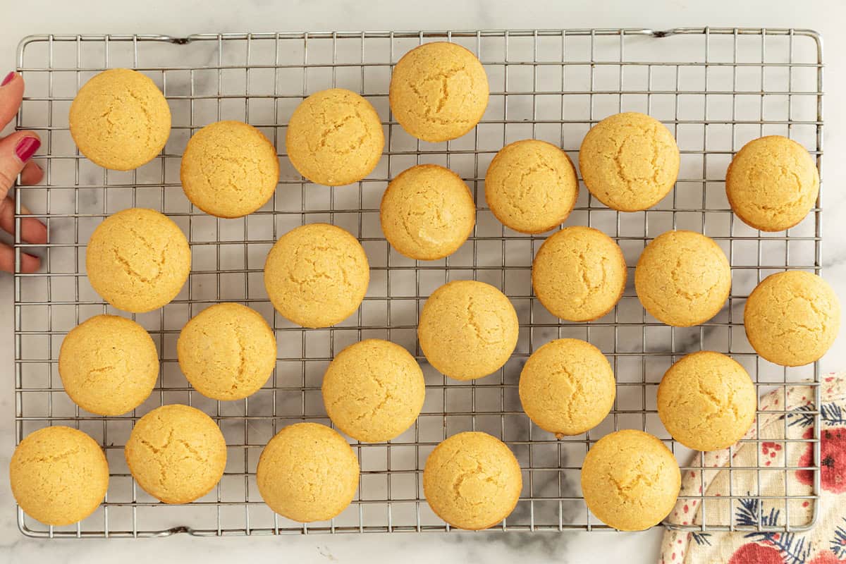 Cornbread muffins on cooling rack.