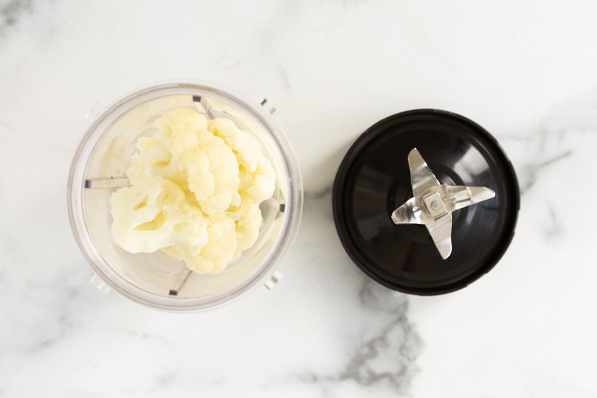 Cauliflower in food processor.