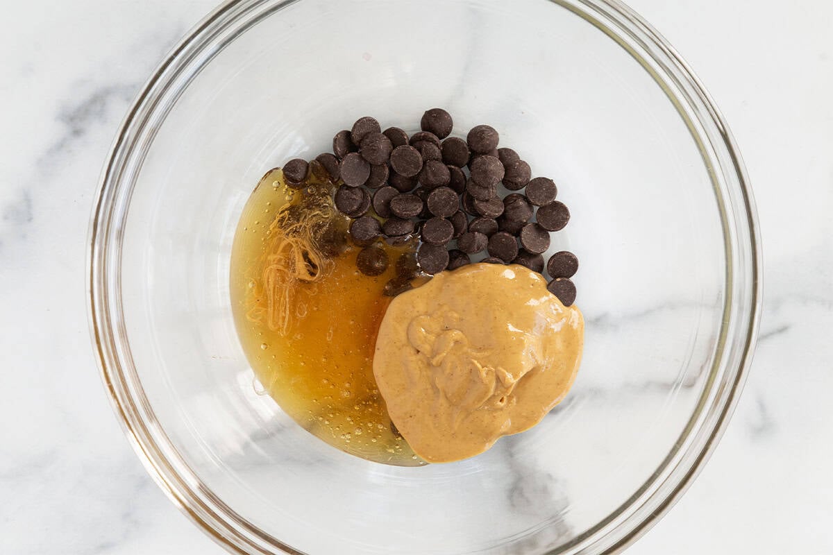 Ingredients for no bake chocolate cookies in bowl before mixing.