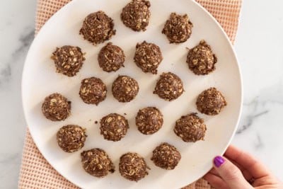 No bake chocolate cookies on white plate.