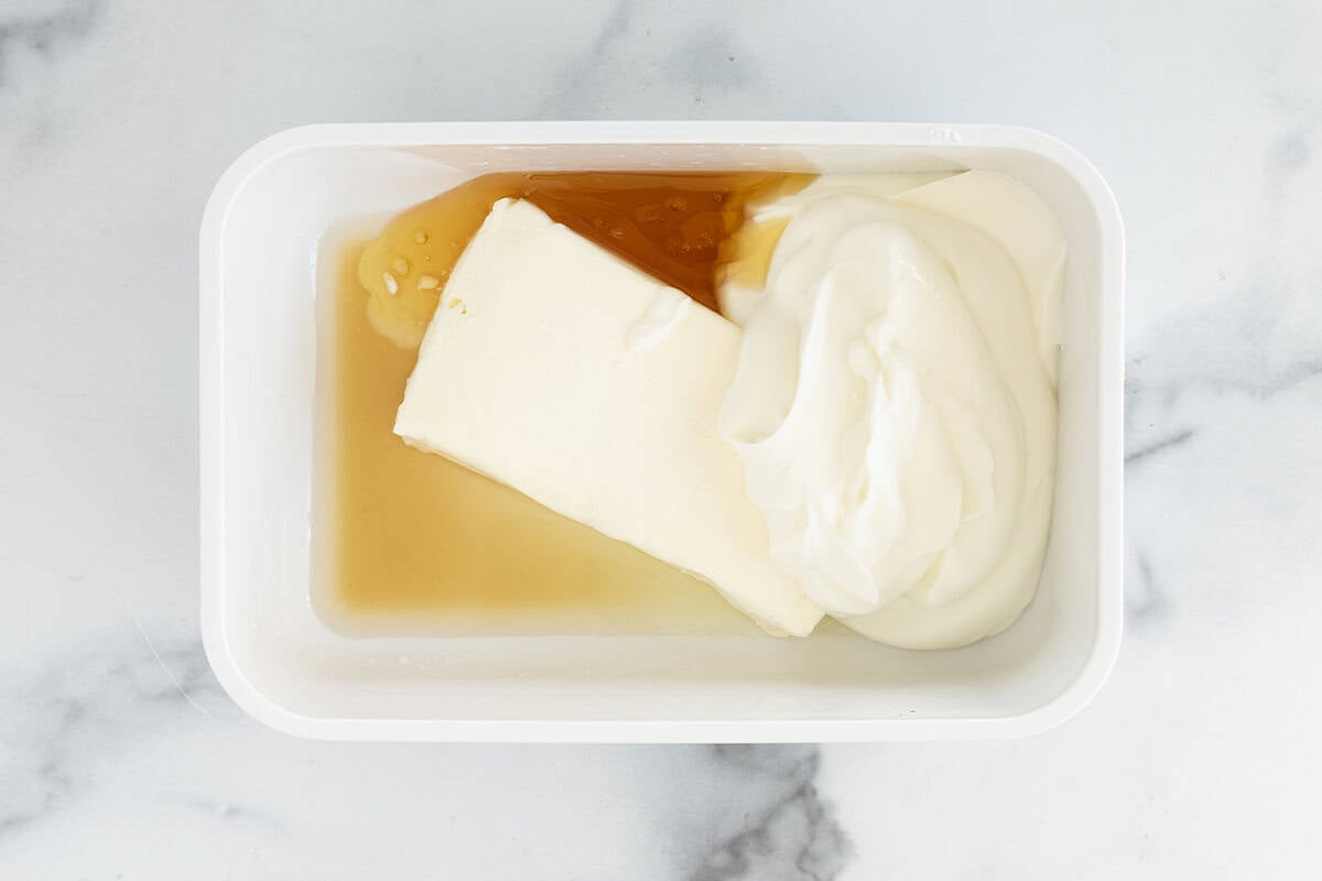 ingredients in vanilla frozen yogurt in container.