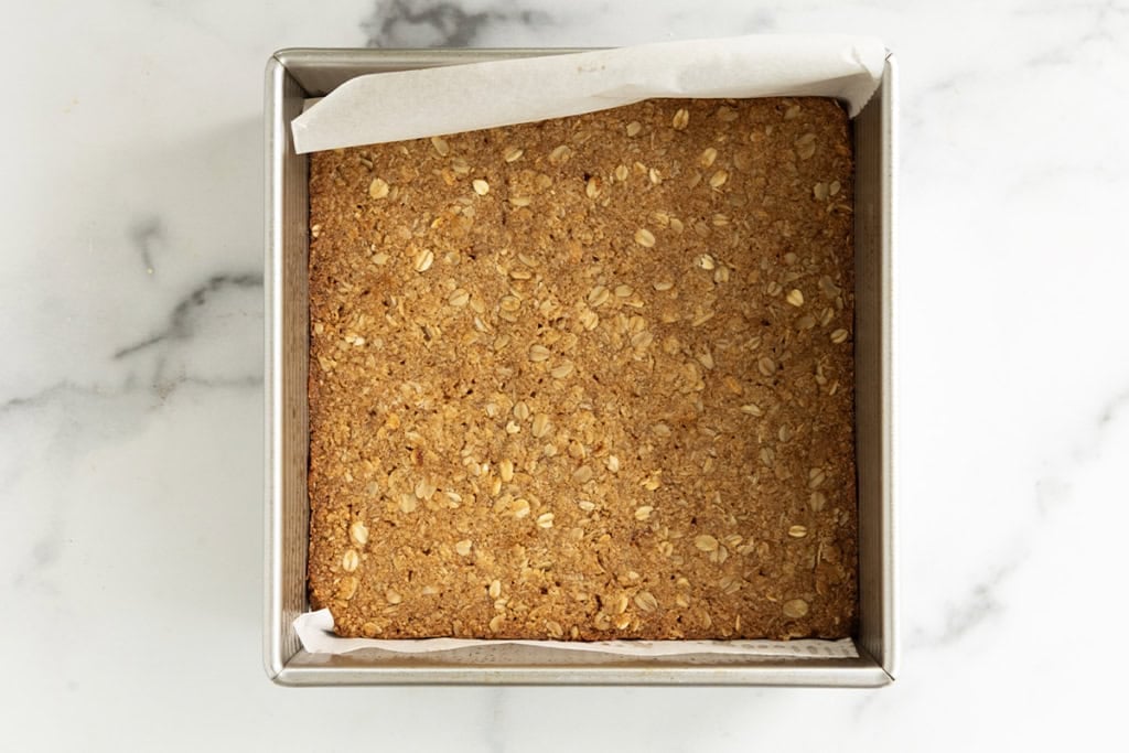 Crunchy granola bars in pan after baking.