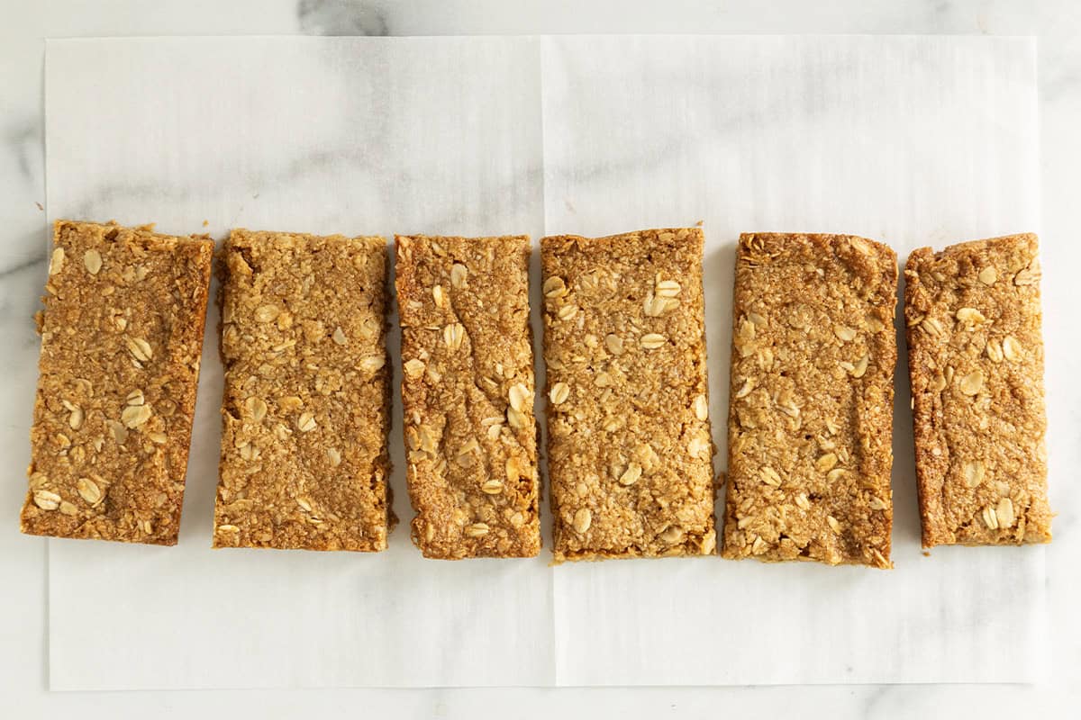 Crunchy granola bars on parchment paper.