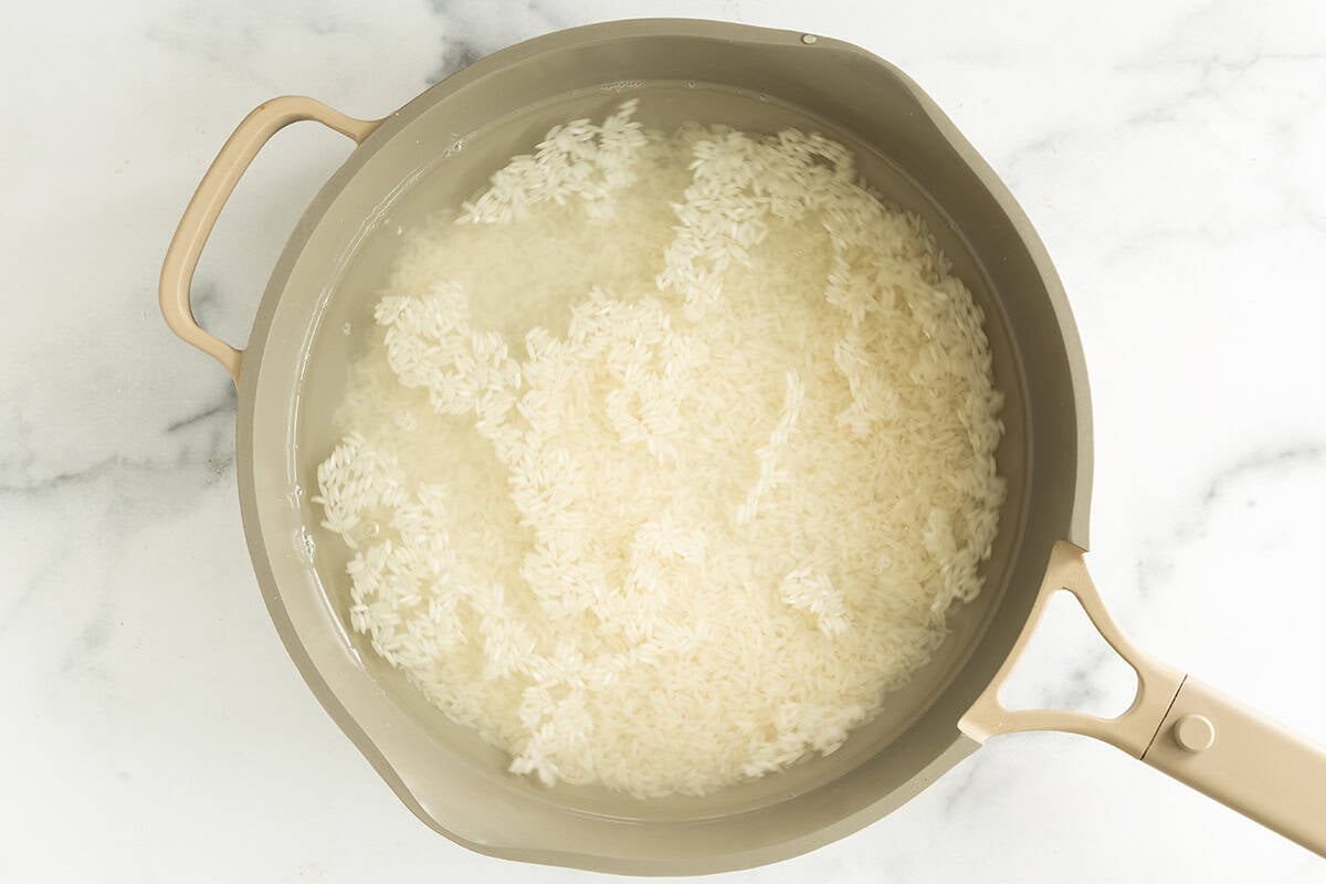 Rice cooking in pot for freezer rice.