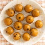 pumpkin protein balls on plate.