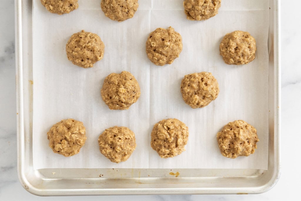 Applesauce cookies on sheet pan after baking.