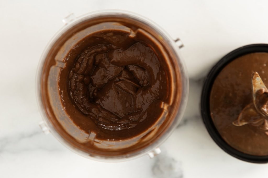 Mixture for chocolate banana popsicles in blender.