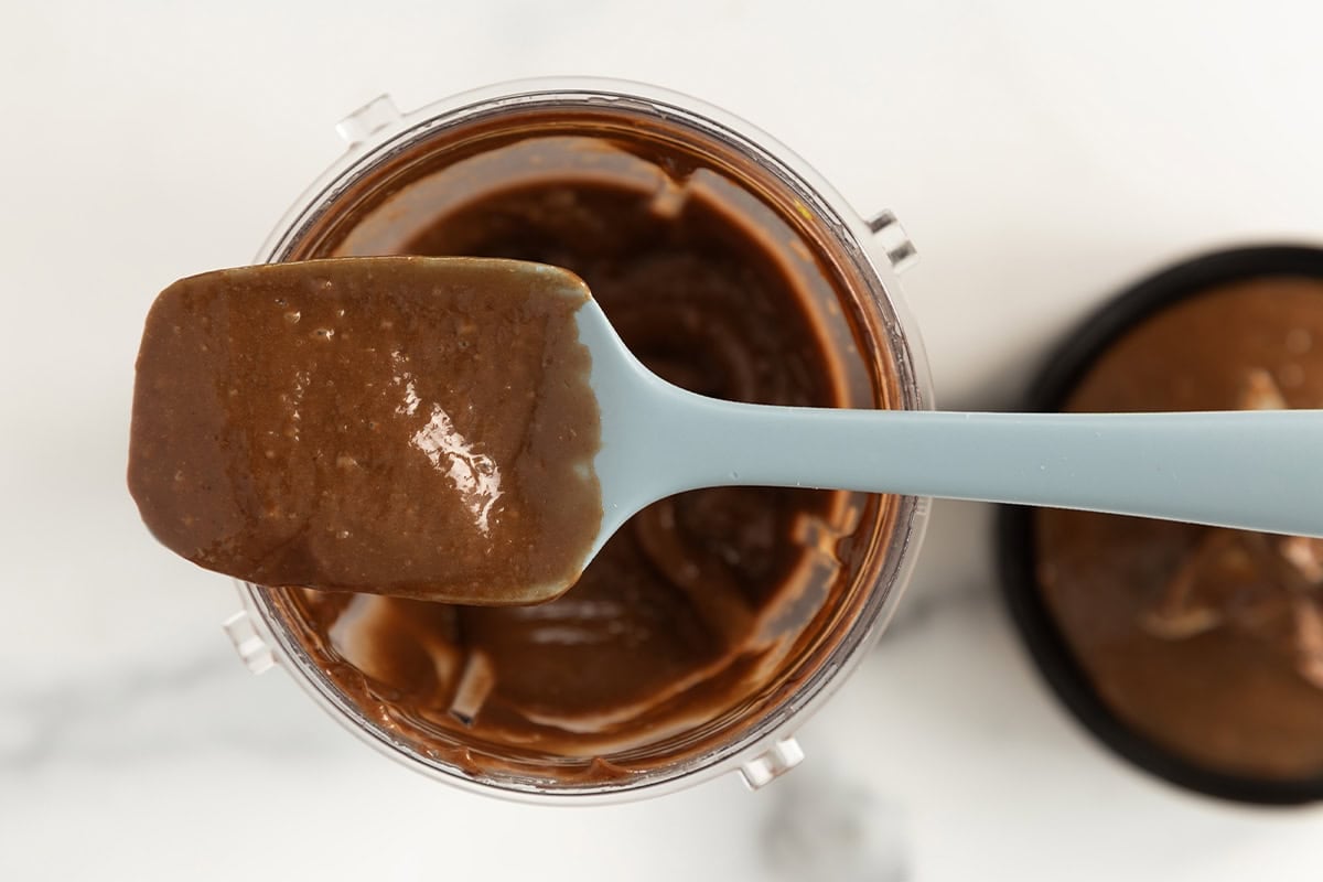 Mixture for chocolate avocado pudding in blender.
