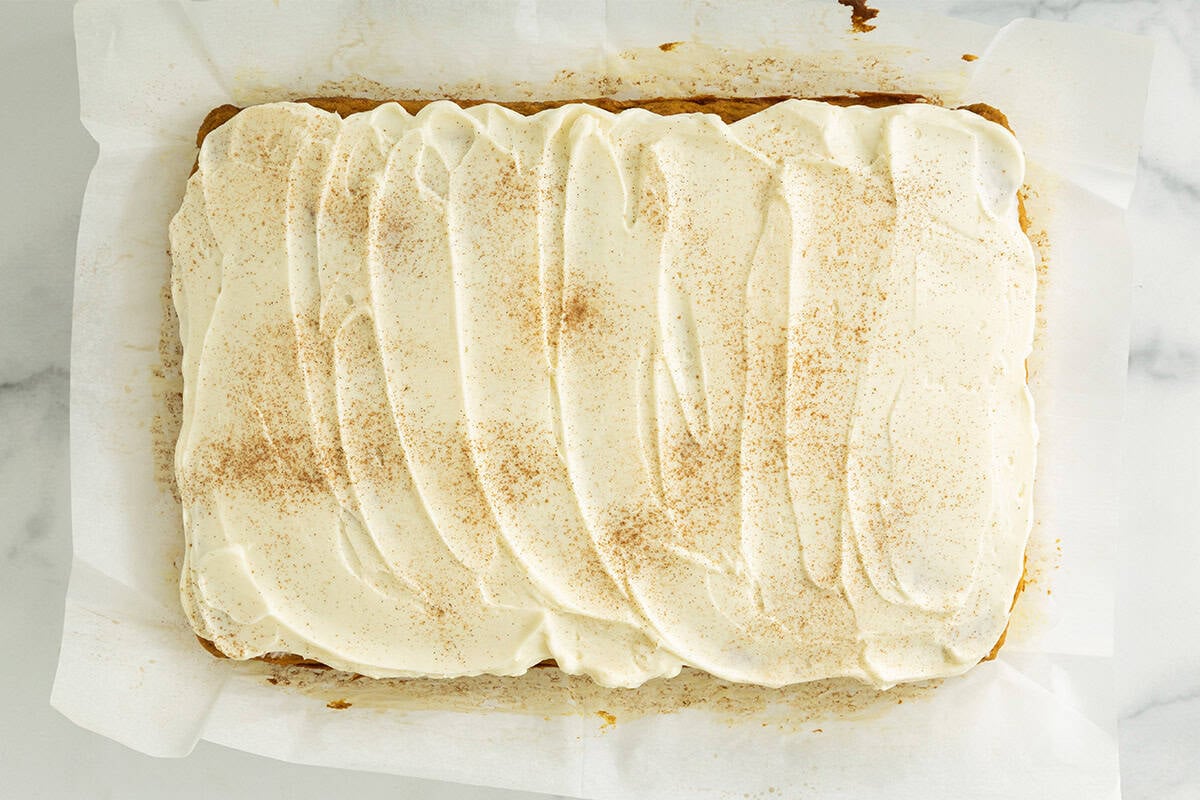 Pumpkin bars with cream cheese frosting on top.