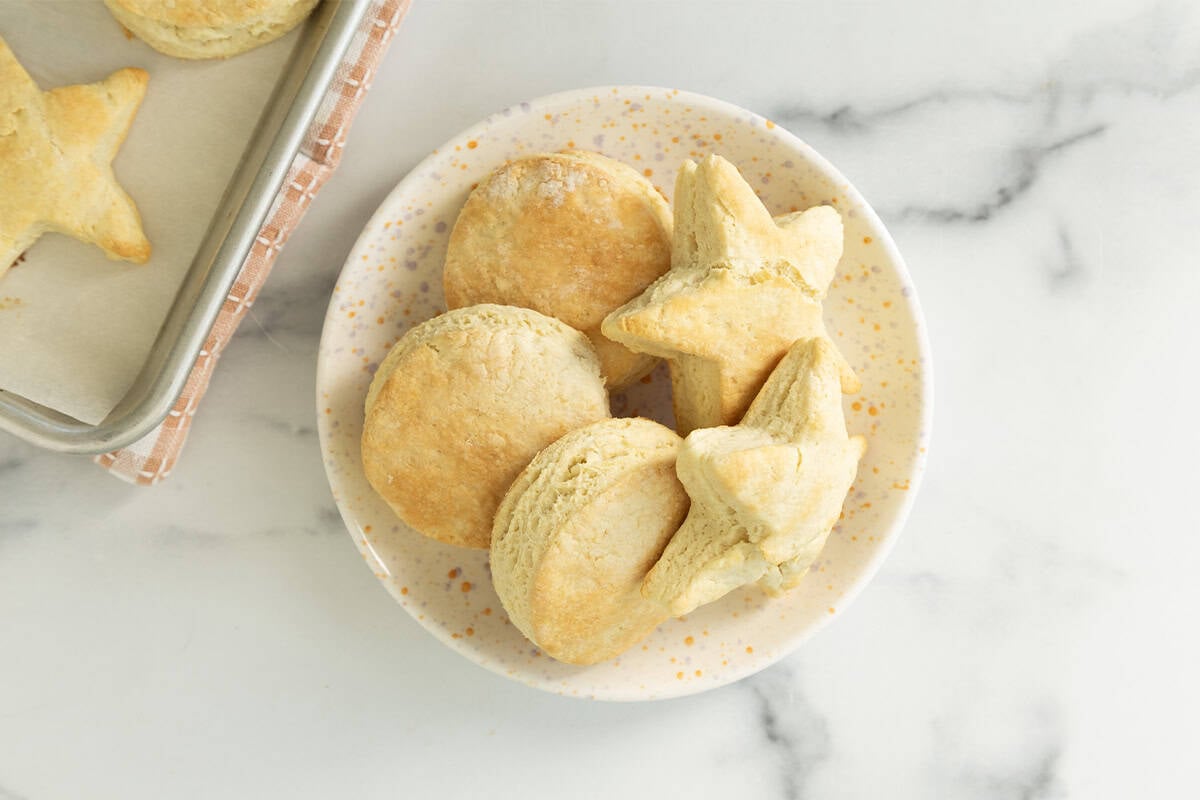 White plate of biscuits. 