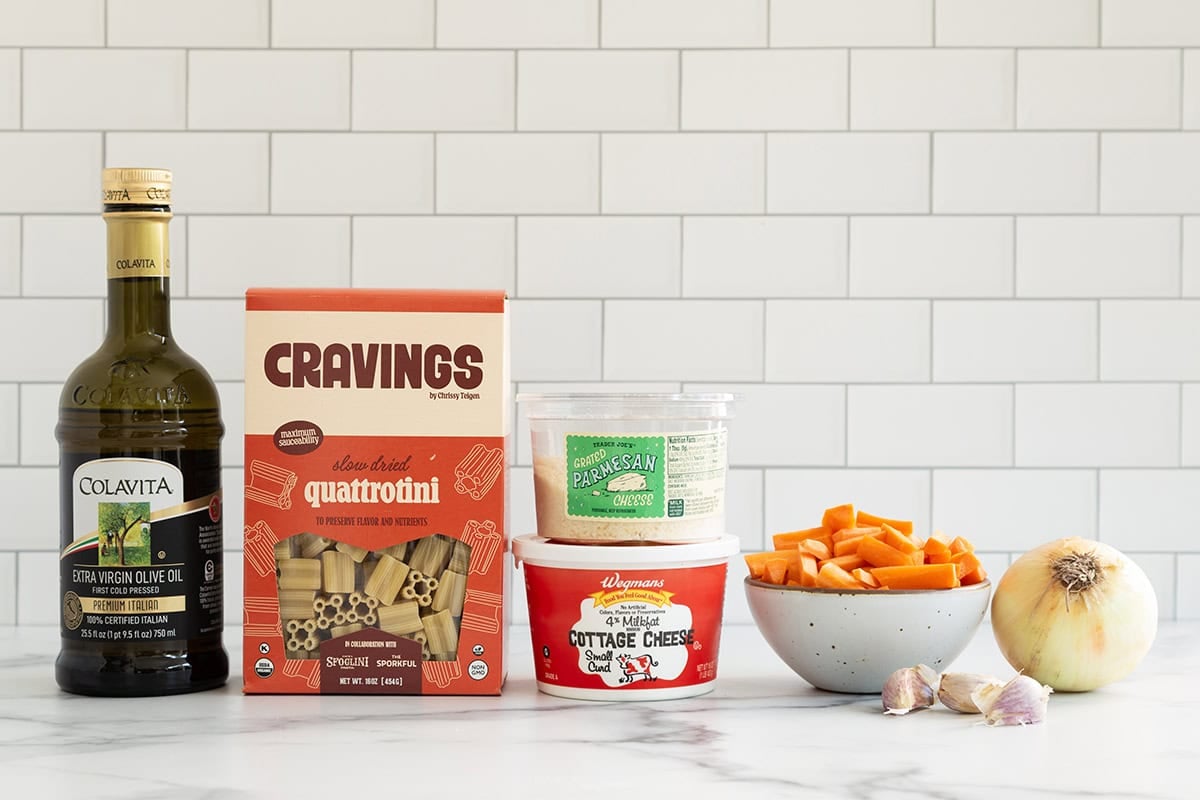 Ingredients for carrot pasta on countertop.