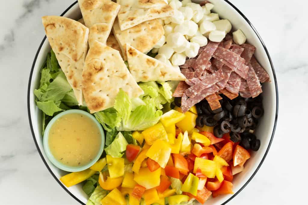 Pizza salad in large bowl.