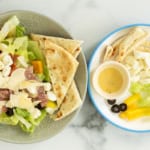 Pizza salad on two plates.