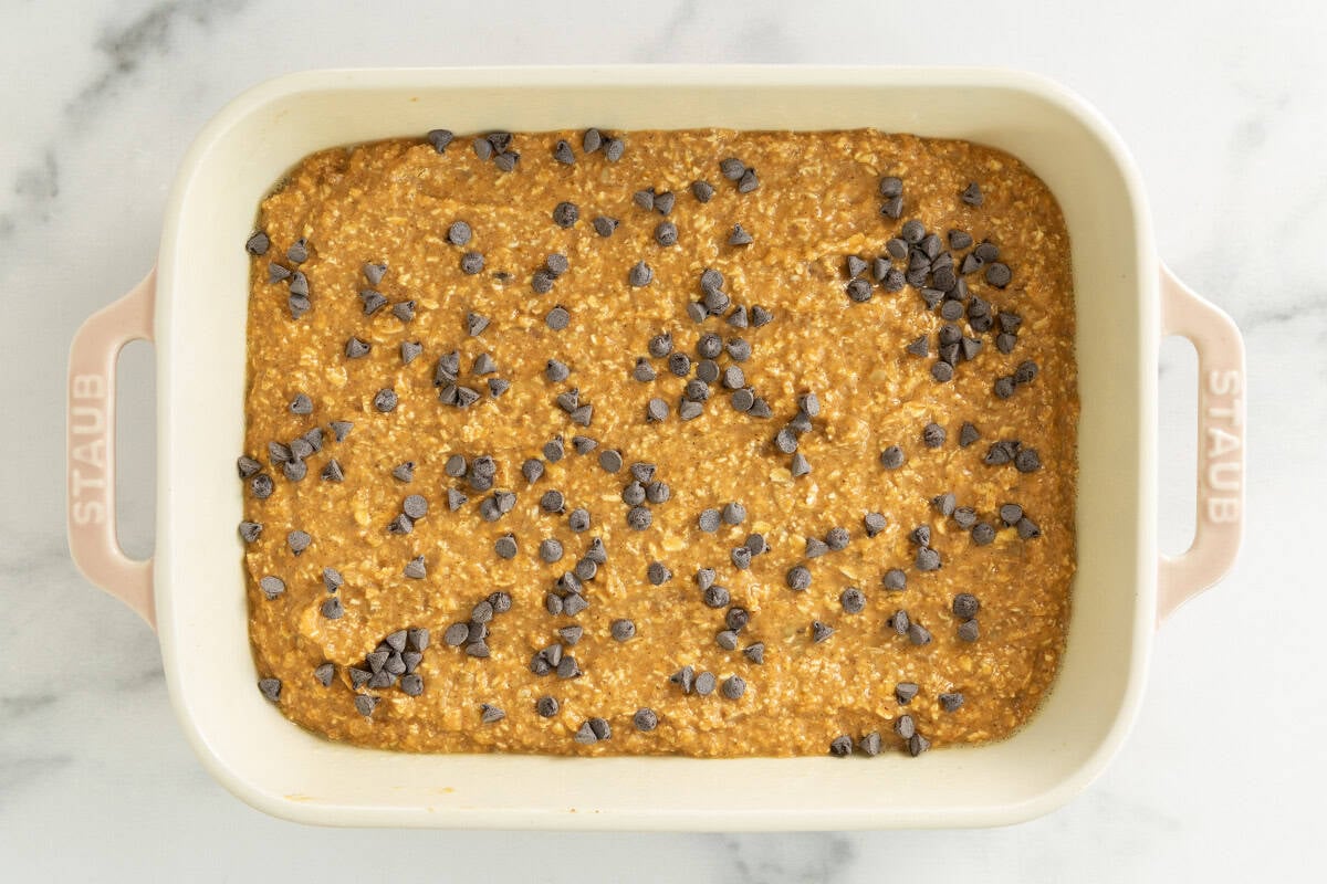 Pumpkin baked oatmeal in pan before baking.