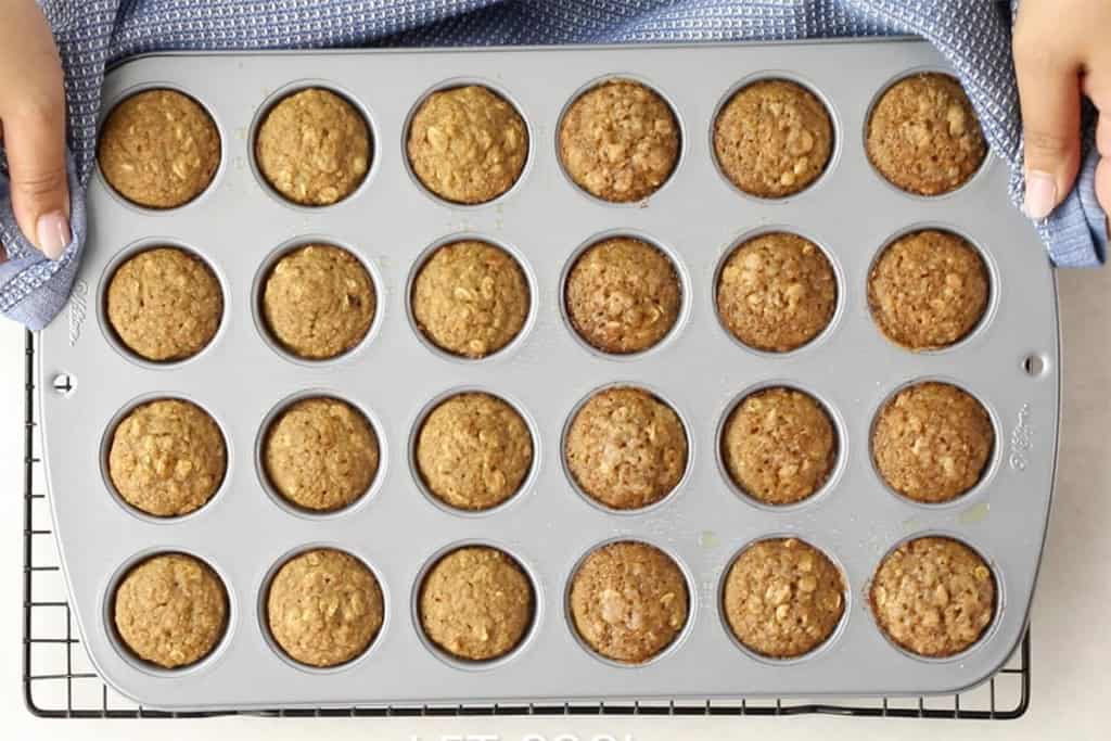 Applesauce muffins in muffin pan after baking.