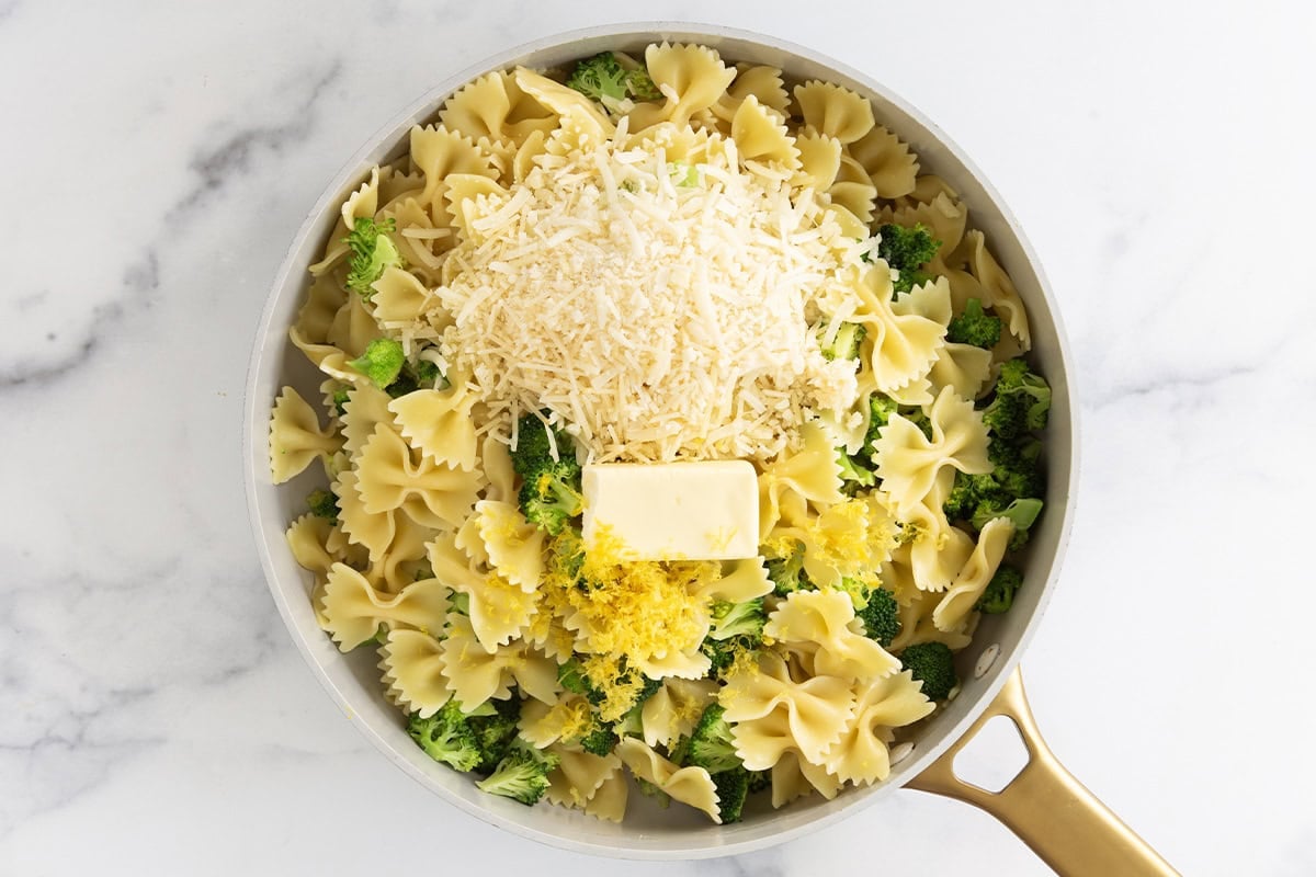 Ingredients for lemon broccoli pasta in pot before mixing.