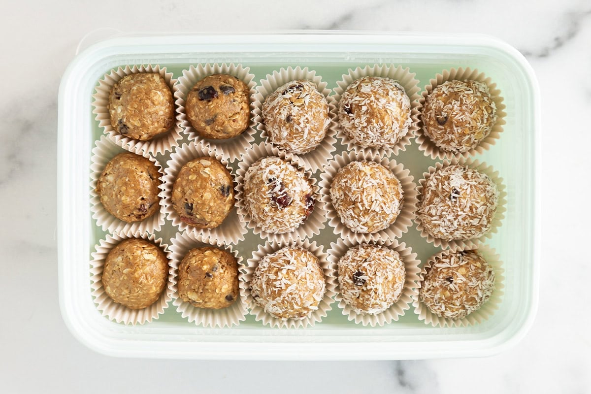 Almond butter protein balls in storage container.