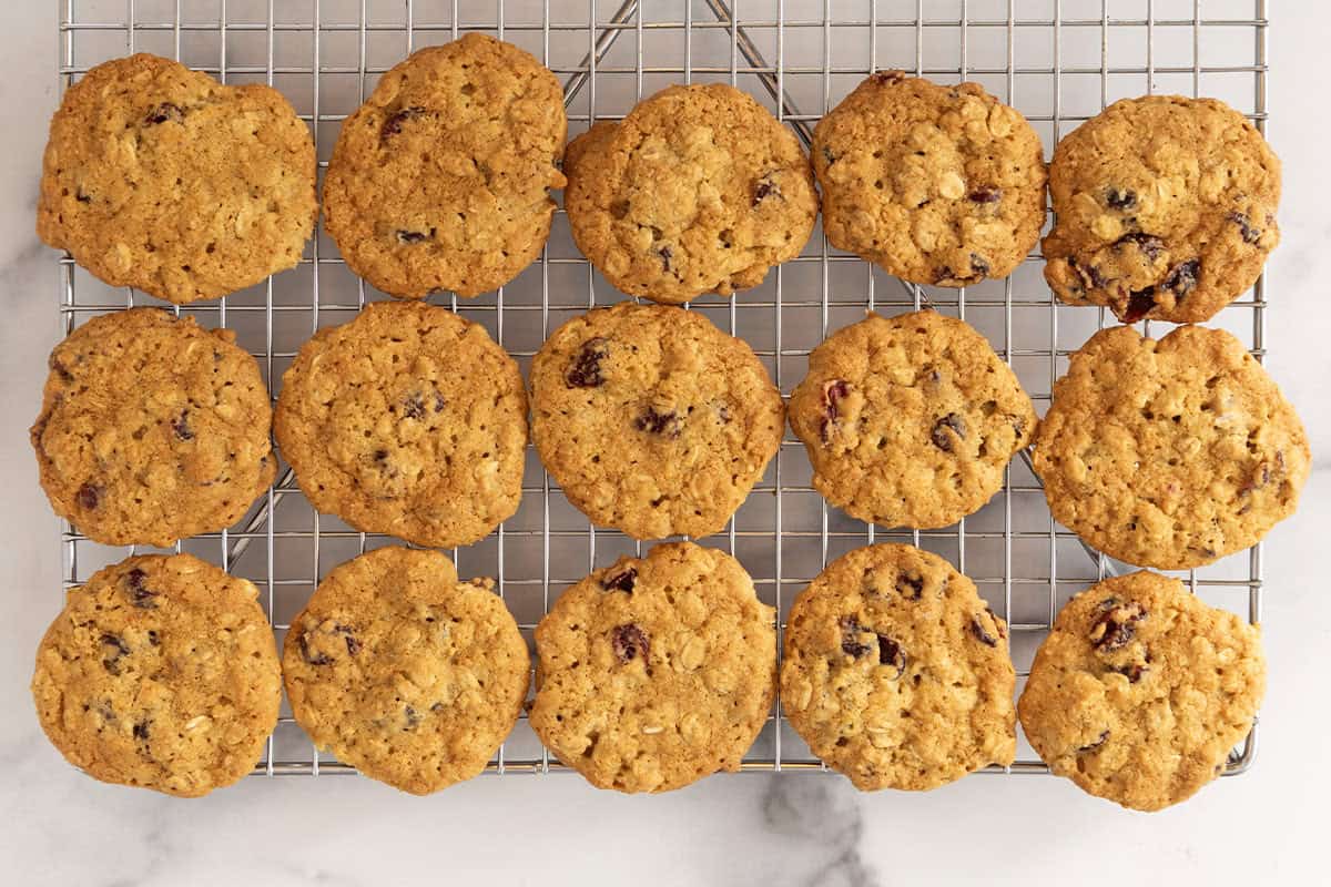 Cranberry cookies on cooking rack.