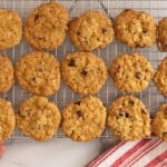Cranberry oatmeal cookies on cooking rack.