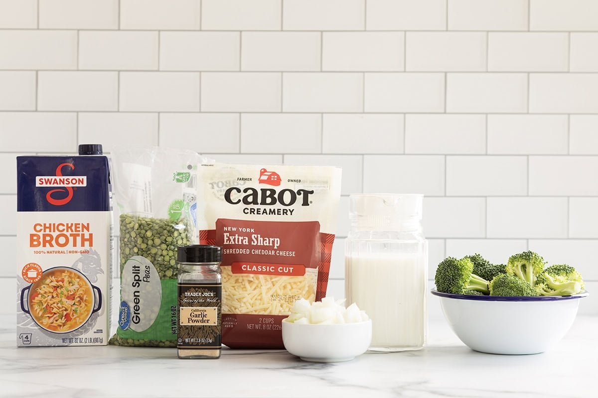 Ingredients for broccoli cheddar soup on countertop.