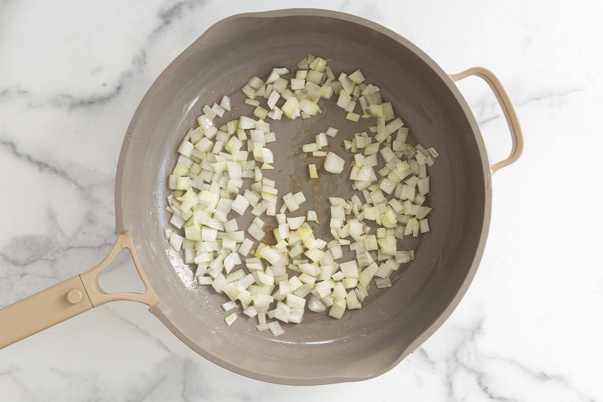 Onions in pan for broccoli cheddar soup.