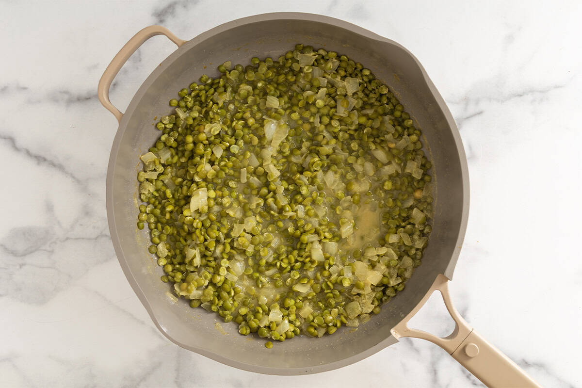 Broccoli in pan for broccoli cheddar soup.