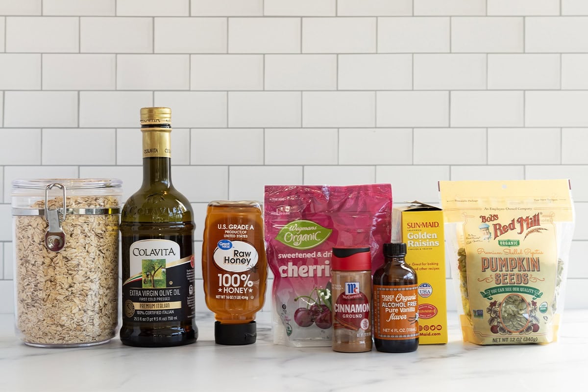Ingredients for olive oil granola on countertop.