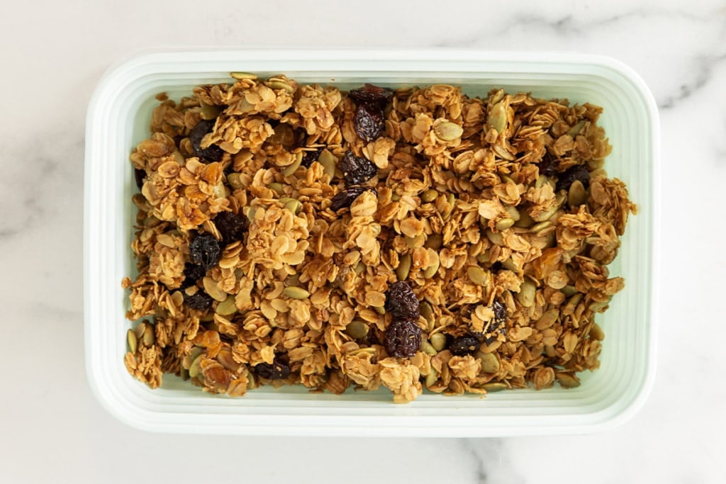 Olive oil granola in storage container.