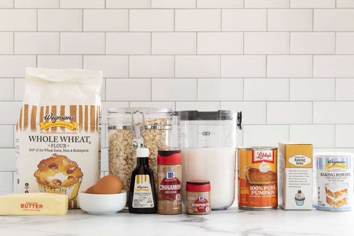 Ingredients for pumpkin oatmeal bread on countertop.