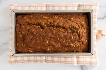 Pumpkin oatmeal bread in baking pan.