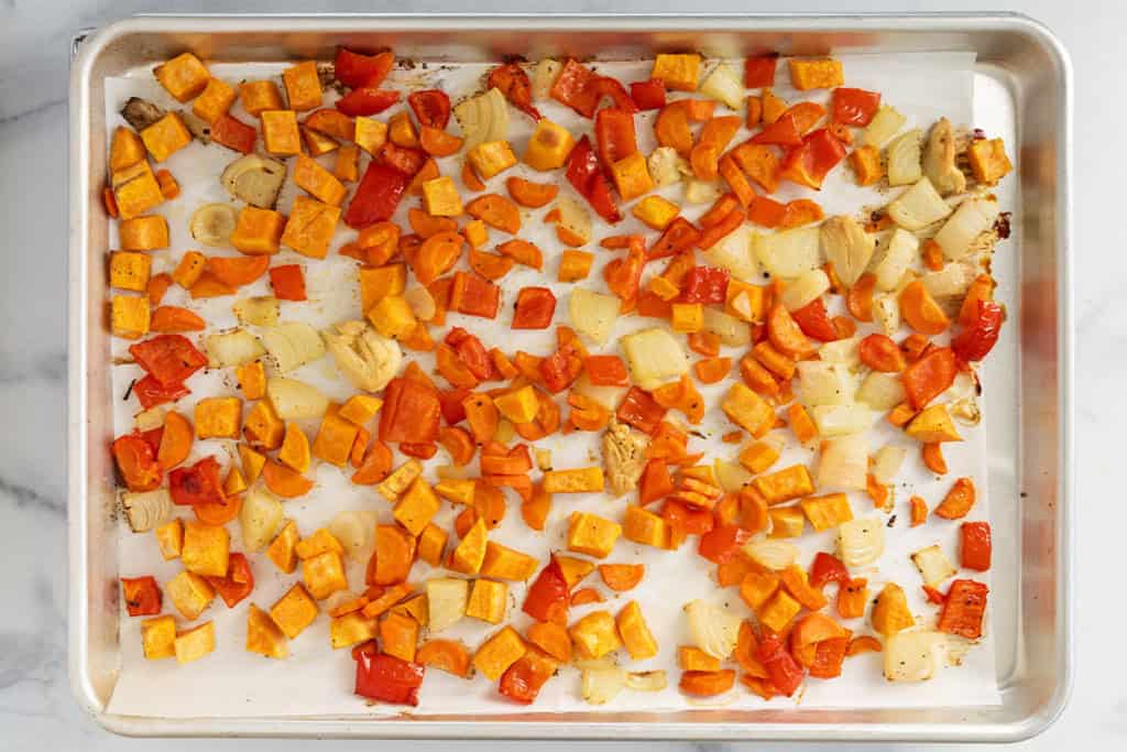 Roasted veggies on sheet pan for roasted veggies pasta sauce.
