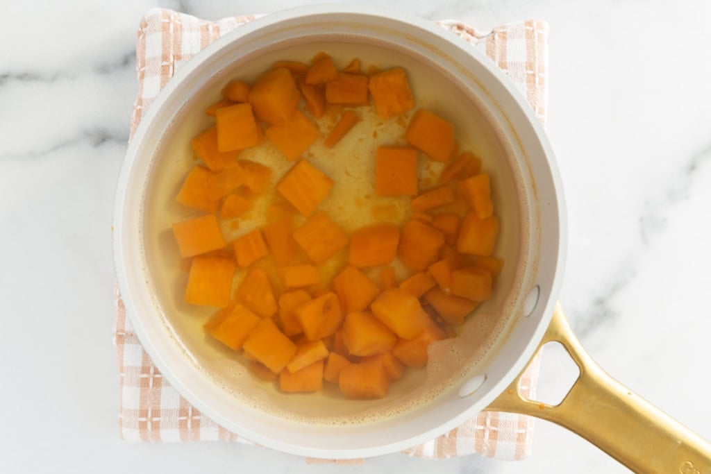 Sweet potato cubes in water for sweet potato oatmeal.