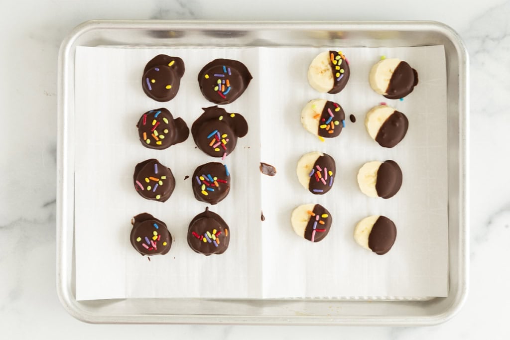 Banana bites on parchment paper.