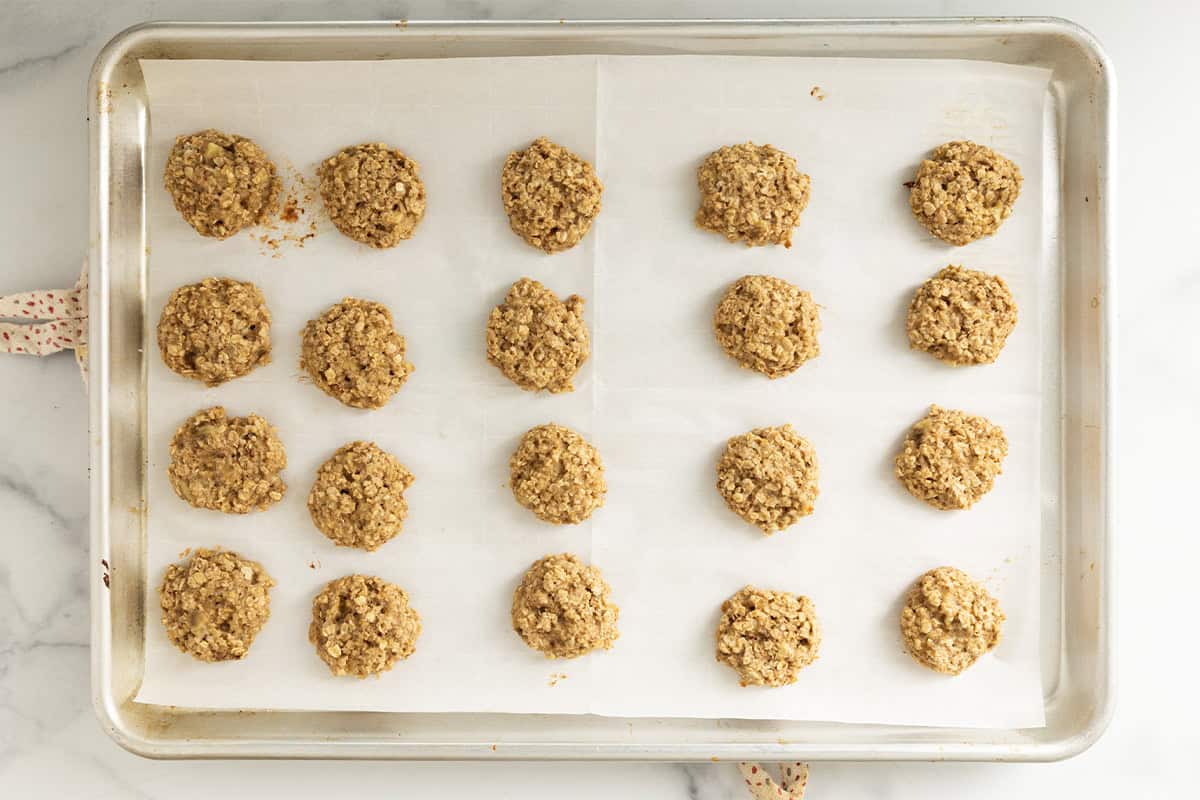 Banana oatmeal cookies on tray after baking.