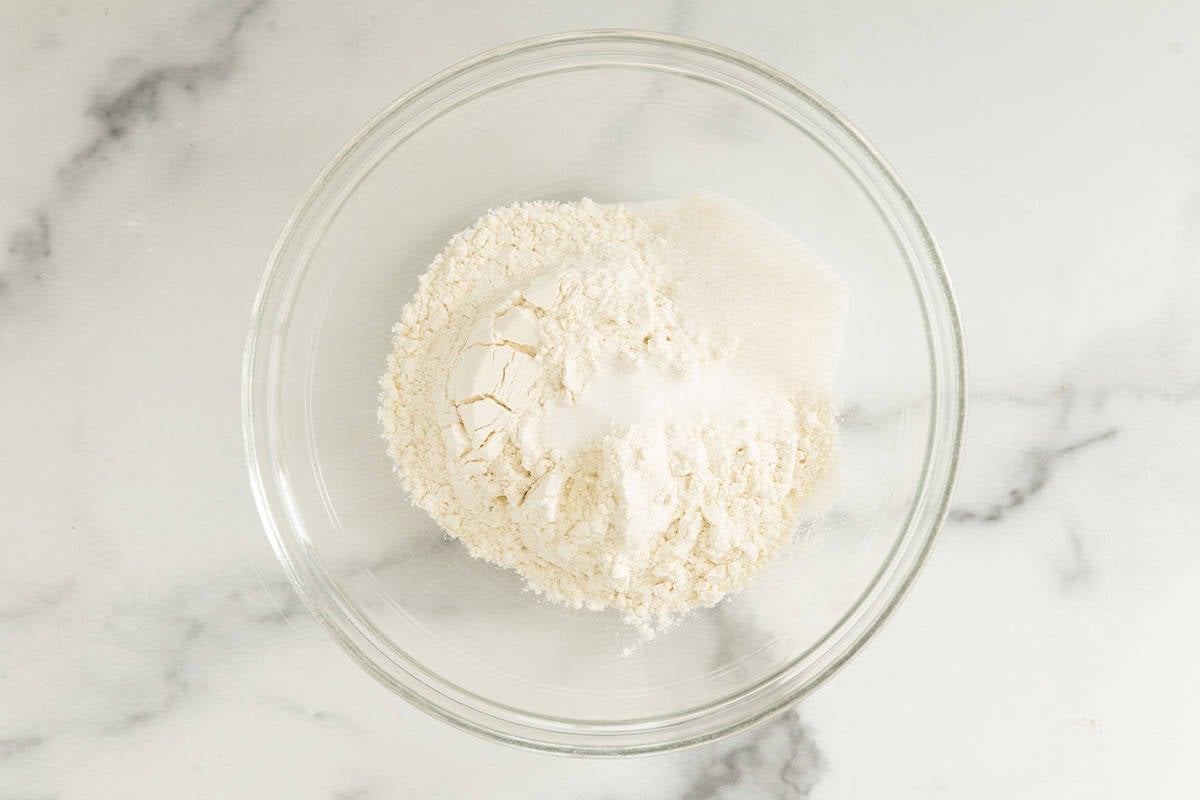 Dry ingredients in bowl for blueberry waffles.