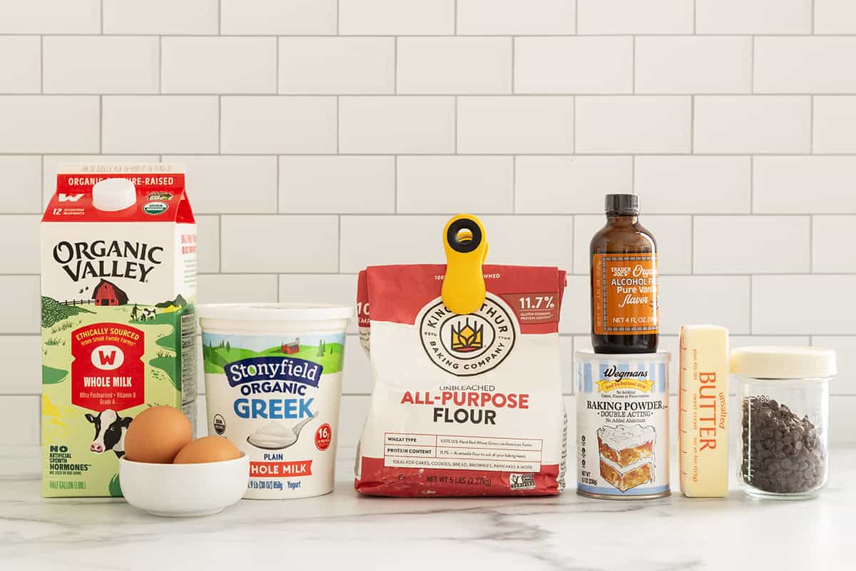 Ingredients for chocolate chip waffles on countertop.