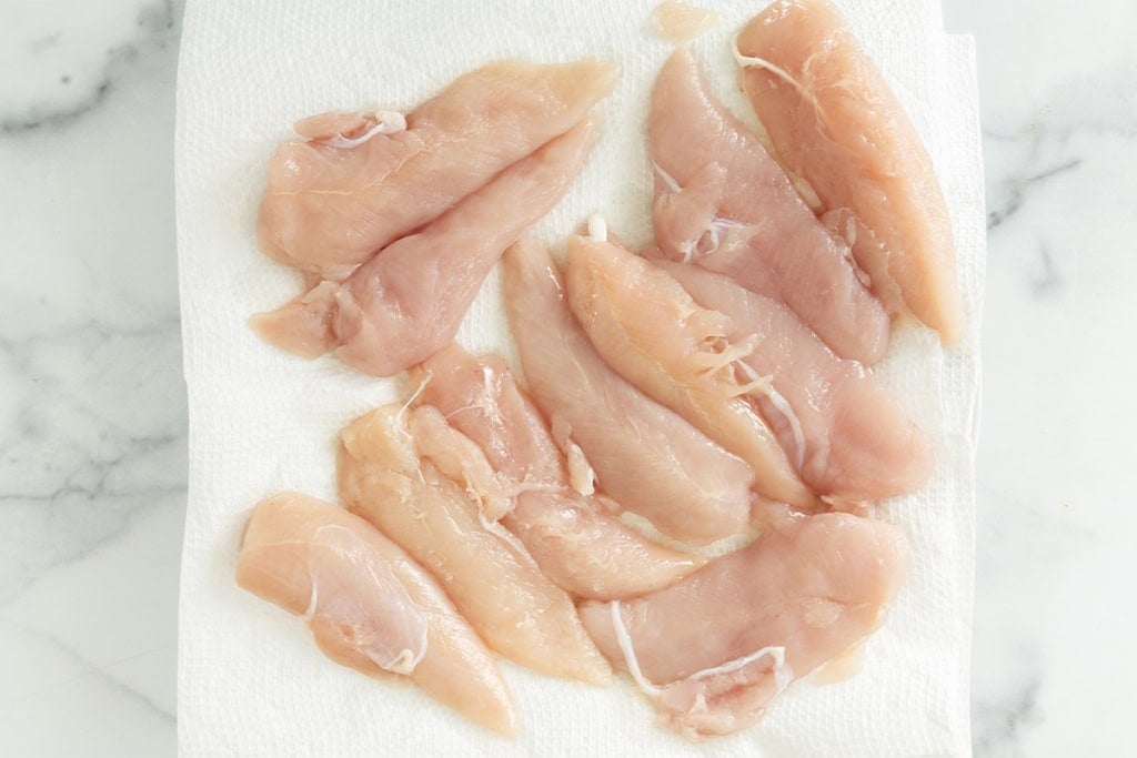 Chicken filets on paper towel for pan seared chicken.