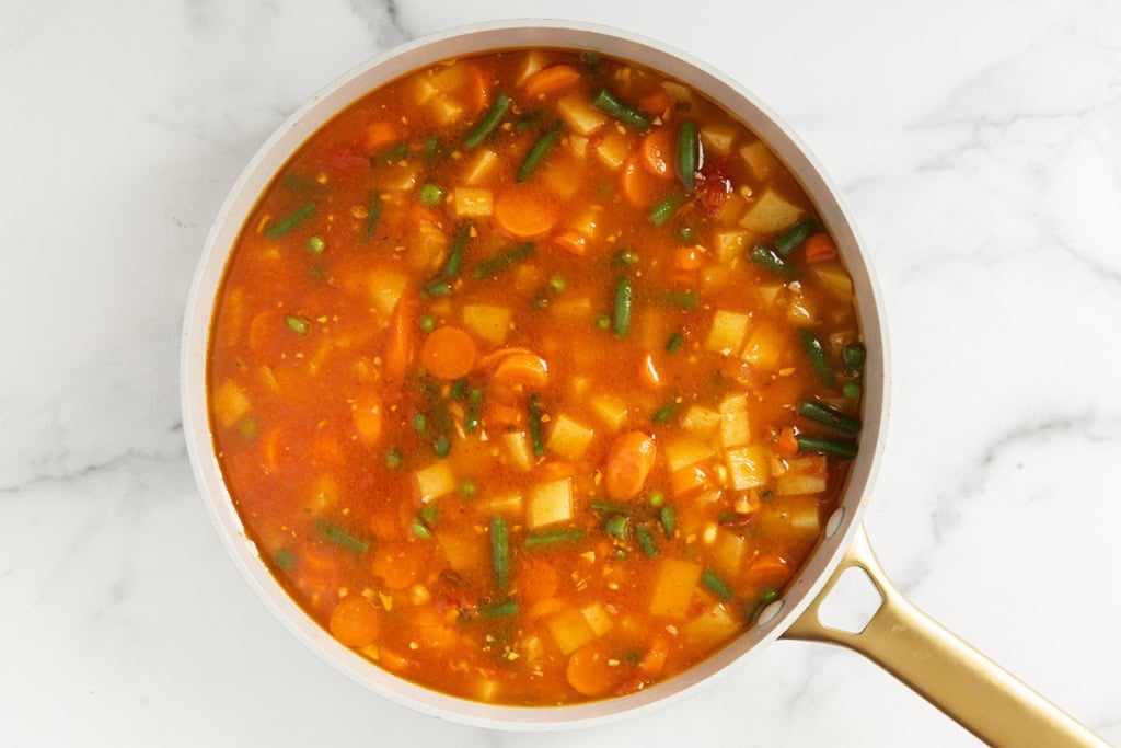 Vegetable soup in pot.